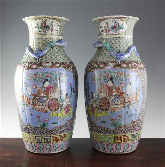 A pair of large Chinese Canton decorated famille rose fluted baluster vases, 45cm